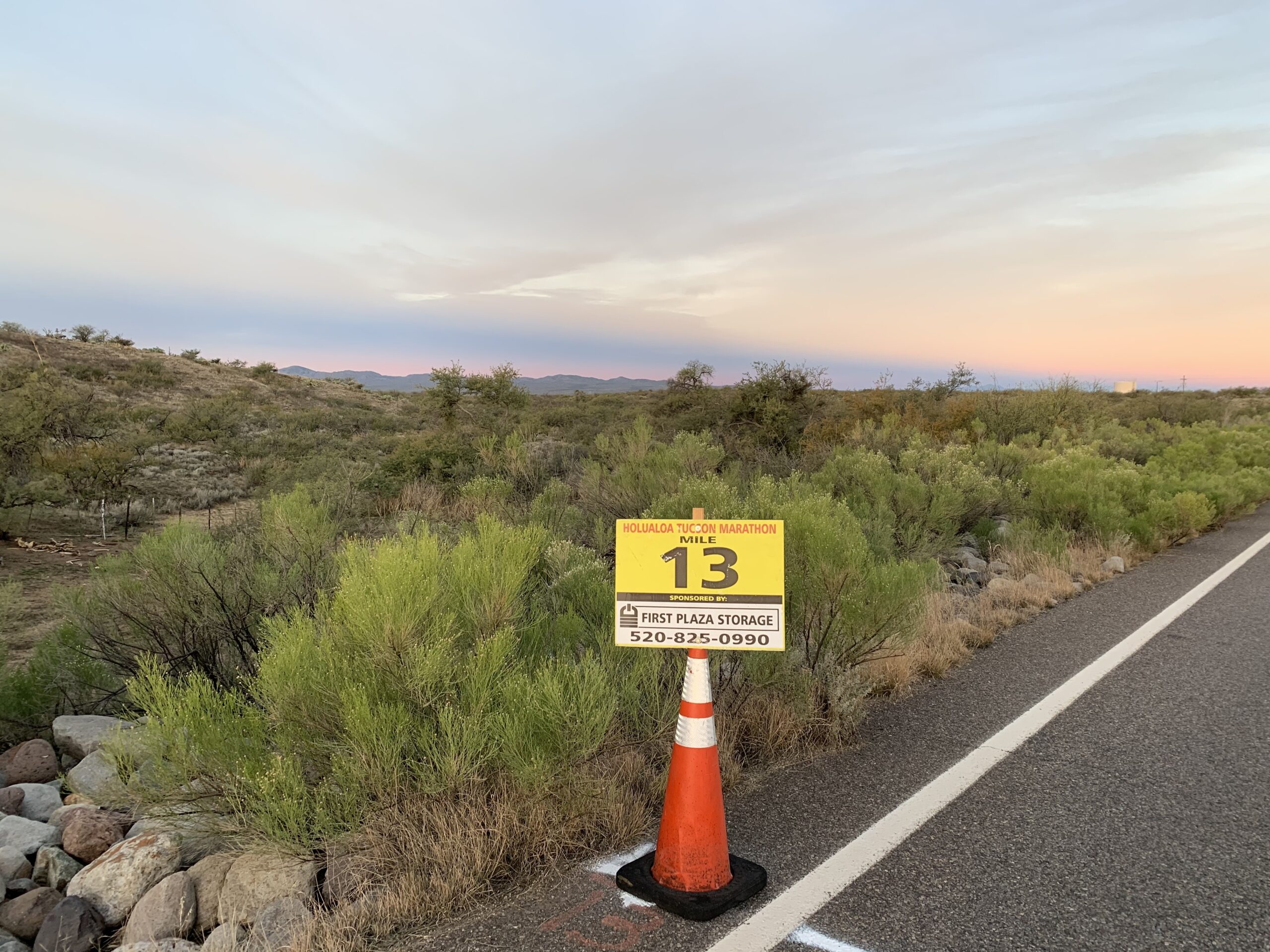 Mile 13 mile marker in a desert at sunrise